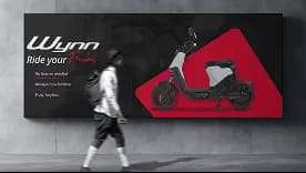 Yulu electric mobility campaign featuring a scooter on an outdoor billboard