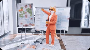 Cat creative strategist presenting ideas and sticky notes during an industry workshop