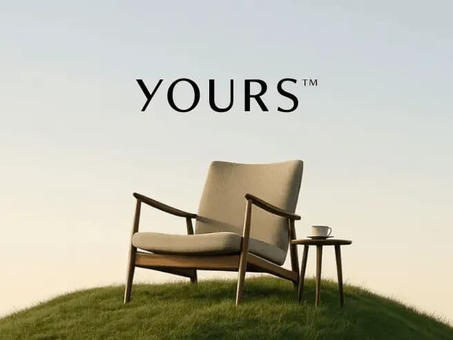 YOURS furniture brand visual featuring a lounge chair in a minimal outdoor setting